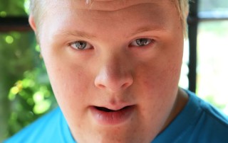 Photo of Ty, an adult with Down Syndrome